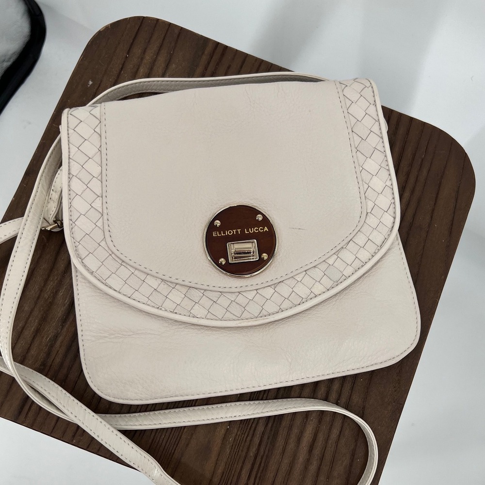 Elliott Lucca Off White Leather Woven Trim Crossbody Bag Turn Lock Closure